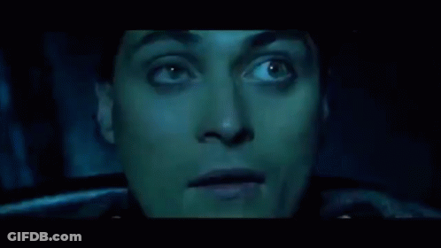 A Blurry Picture Of A Room With A Person Standing In The Background GIF