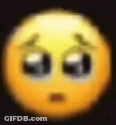 A Blurry Picture Of A Smiley Face With A Sad Look On It . GIF