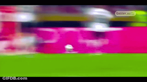 A Blurry Picture Of A Soccer Field With The Words Gocchy.xd On The Bottom Right GIF