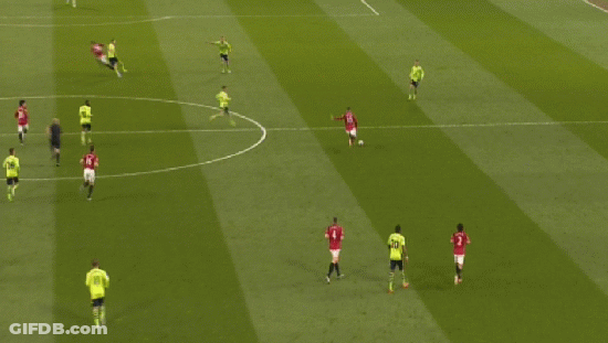 A Blurry Picture Of A Soccer Game With A Goalie Wearing A Yellow Jersey With The Number 25 On It GIF