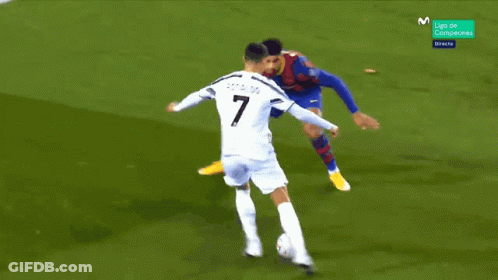 A Blurry Picture Of A Soccer Game With A Player Wearing A White Jersey With The Number 7 On It GIF