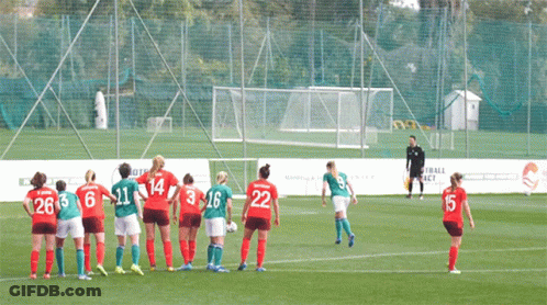 A Blurry Picture Of A Soccer Game With The Number 10 On The Back Of A Player 'S Jersey GIF