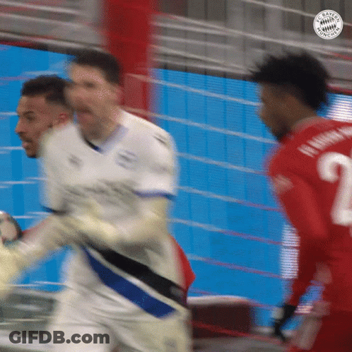 A Blurry Picture Of A Soccer Game With The Number 2 On The Back Of A Player 'S Jersey GIF