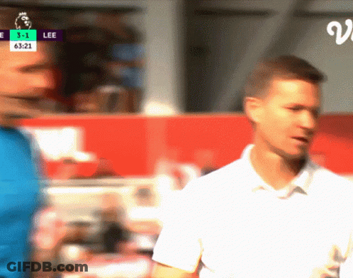 A Blurry Picture Of A Soccer Game With The Score 3-1 Lee GIF
