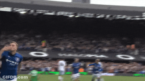 A Blurry Picture Of A Soccer Game With The Word Halopa On The Banner In The Background GIF