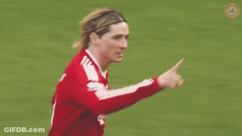 A Blurry Picture Of A Soccer Player Wearing A Headband . GIF