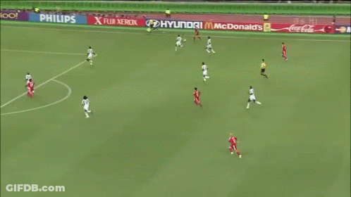 A Blurry Picture Of A Soccer Player With The Letters Ps Hi On The Bottom Left GIF