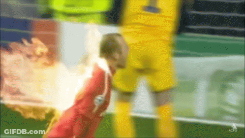 A Blurry Picture Of A Soccer Player With The Number 1 On The Back Of His Jersey GIF