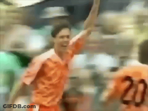 A Blurry Picture Of A Soccer Player With The Number 20 On His Back GIF