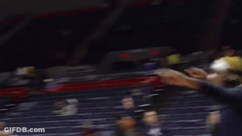 A Blurry Picture Of A Stadium With A Sign That Says ' A & E ' On It GIF
