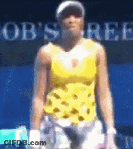 A Blurry Picture Of A Tennis Player In Front Of A Sign That Says Bob 'S Ree GIF
