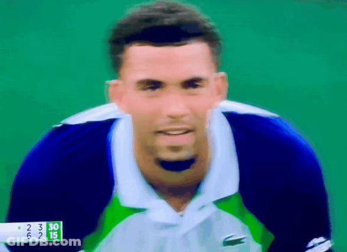 A Blurry Picture Of A Tennis Player With A Score Of 30 GIF