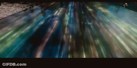 Blurry Train Moving Down Tracks GIF
