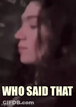 A Blurry Picture Of A Woman 'S Face With The Words `` Who Said That '' Below It . GIF
