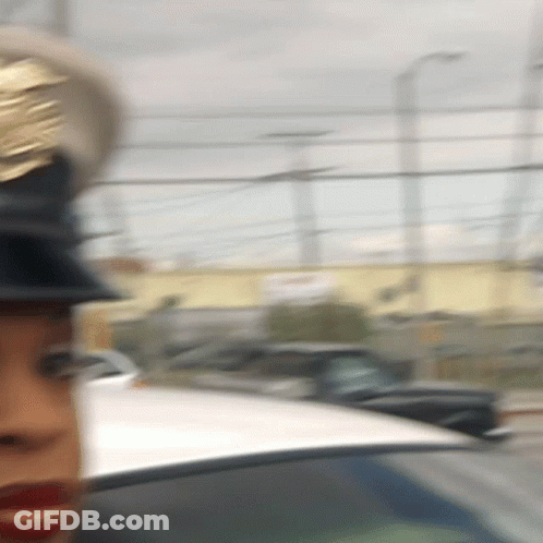 Blurry Woman Wearing Hat And Red Lips GIF