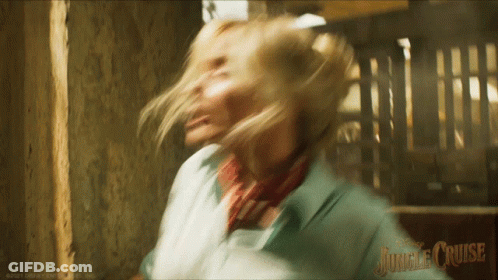 A Blurry Picture Of A Woman With Jungle Cruise Written On The Bottom Right GIF