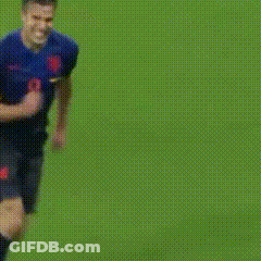 A Blurry Picture Of Soccer Players On A Field With One Wearing Yellow Shorts GIF