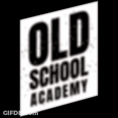 A Blurry Picture Of The Old School Academy Logo On A Black Background GIF