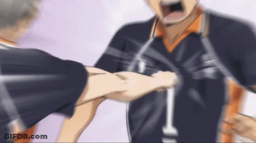 A Blurry Picture Of Two Volleyball Players Fighting Each Other In A Game . GIF