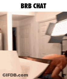 A Blurry Picture With The Words Brb Chat On The Bottom GIF