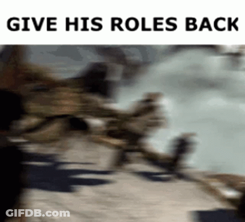 A Blurry Picture With The Words Give His Roles Back On The Bottom GIF