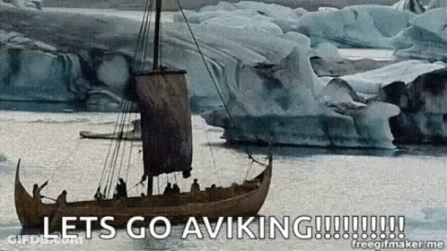 A Boat Is Floating On Top Of A Body Of Water Surrounded By Icebergs . GIF