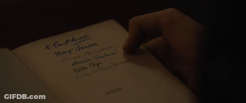 A Book Is Open To A Page That Says " Dreams " On It GIF