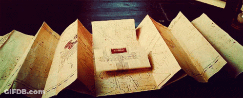 A Book Is Open To A Page That Says " Harry Potter " GIF