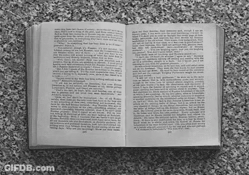 A Book Is Open To A Page That Says ' I 'M Sorry ' On It GIF