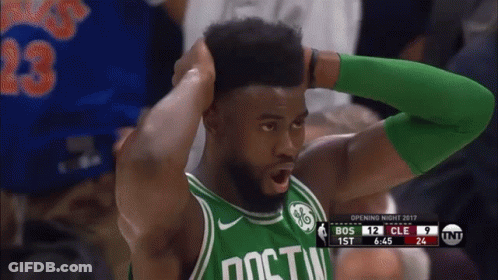 A Boston Celtics Player Holds His Head In His Hands GIF