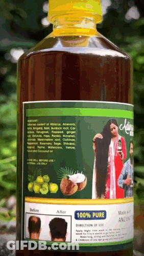 A Bottle Of 100 % Pure Hair Oil Has A Before And After Picture On The Label GIF