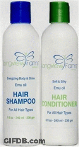 A Bottle Of All Natural Skin Bleaching Lotion With A Black Cap GIF
