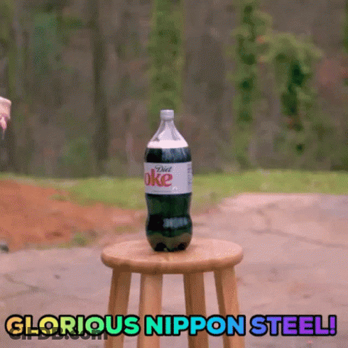A Bottle Of Diet Coke Is Sitting On A Wooden Stool With The Words Glorious Nippon Steel Below It GIF