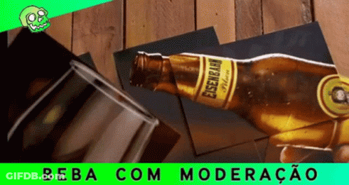 A Bottle Of Eisenbahn Beer Is Displayed On A Wooden Table GIF
