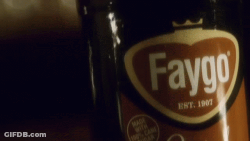A Bottle Of Faygo Is Being Held By A Person GIF