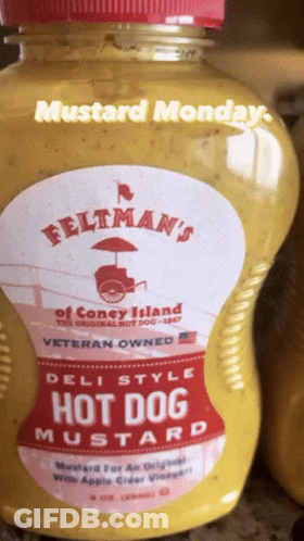 A Bottle Of Feltman 'S Hot Dog Mustard Is On A Counter GIF