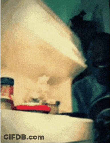 A Bottle Of Heinz Ketchup Sits On A Countertop GIF