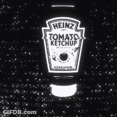 A Bottle Of Heinz Tomato Ketchup Is Surrounded By Stars GIF