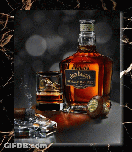 A Bottle Of Jack Daniel 'S Single Barrel Sits Next To A Glass Of Whiskey GIF