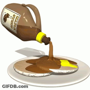 A Bottle Of Maple Syrup Is Being Poured Over A Pancake GIF