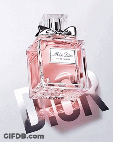 A Bottle Of Miss Dior Eau De Toilette Sits On A Dior Logo GIF