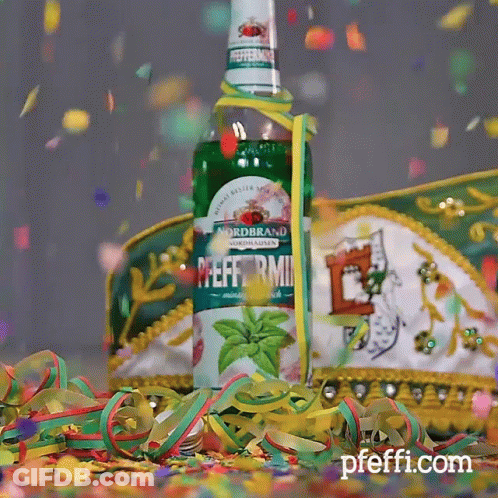 A Bottle Of Nordbrand Peppermint Is Surrounded By Confetti And Streamers GIF