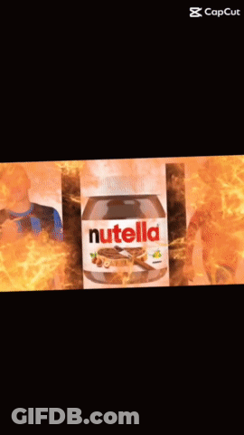 A Bottle Of Nutella Sits Next To A Boy In A Blue And Black Shirt GIF