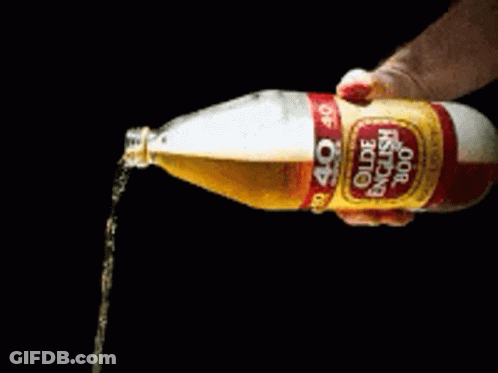 A Bottle Of Olde English 800 Is Being Poured Into Someone 'S Hand GIF