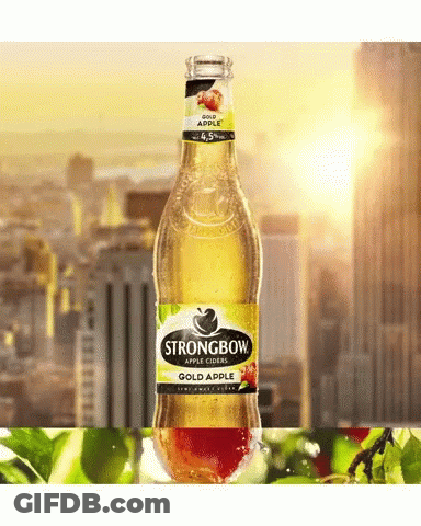 A Bottle Of Strongbow Apple Cider In Front Of A Cityscape GIF