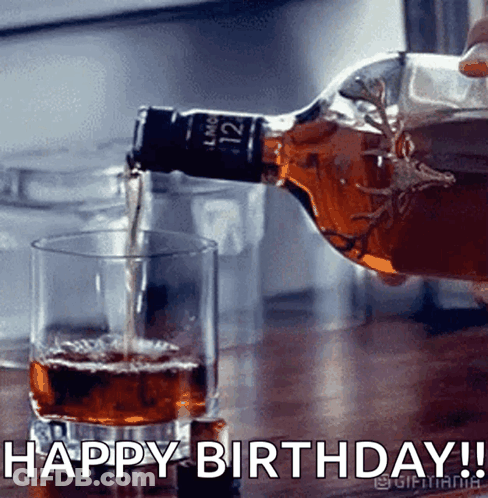 A Bottle Of Whiskey Is Being Poured Into A Glass With The Caption Happy Birthday ! GIF