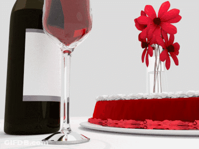 A Bottle Of Wine Next To A Glass Of Wine And A Cake With Red Frosting GIF