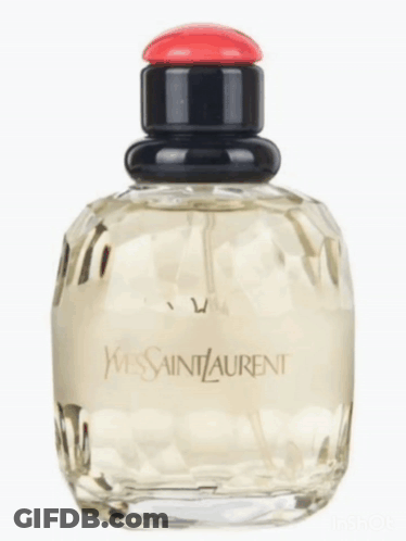 A Bottle Of Yves Saint Laurent Paris Perfume GIF