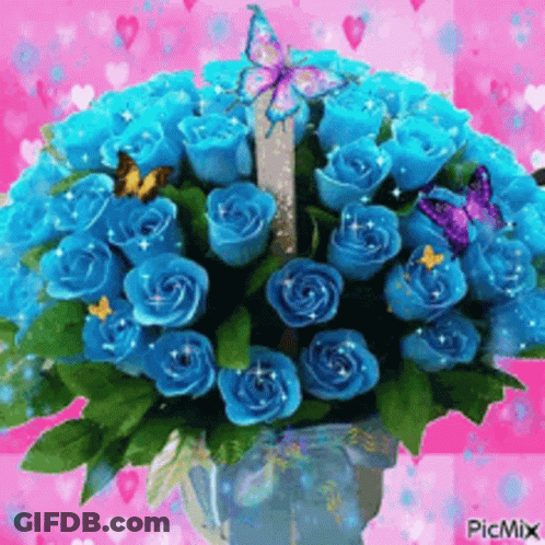 A Bouquet Of Blue Roses In A Vase With Butterflies On A Pink Background . GIF