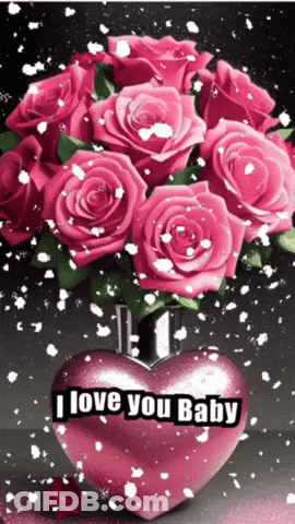 A Bouquet Of Pink Roses In A Heart Shaped Vase With The Words " I Love You Baby " GIF